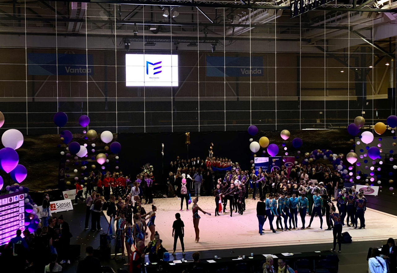 Aesthetic group gymnastics European Championships at Energia Areena: teams on the competition floor, balloon decorations and colored lighting
