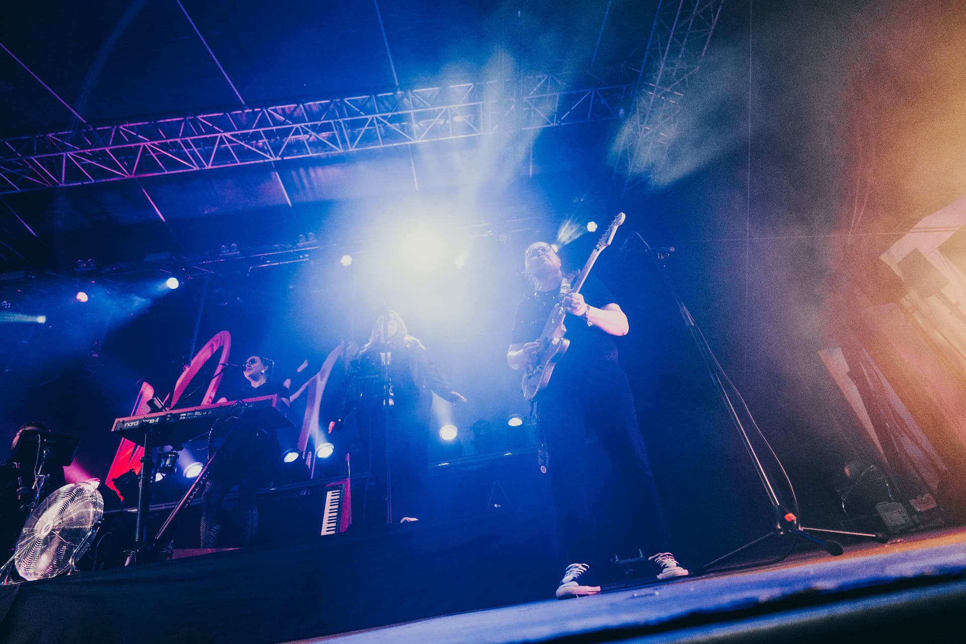 Meiju Suvas and her band under vivid stage lighting