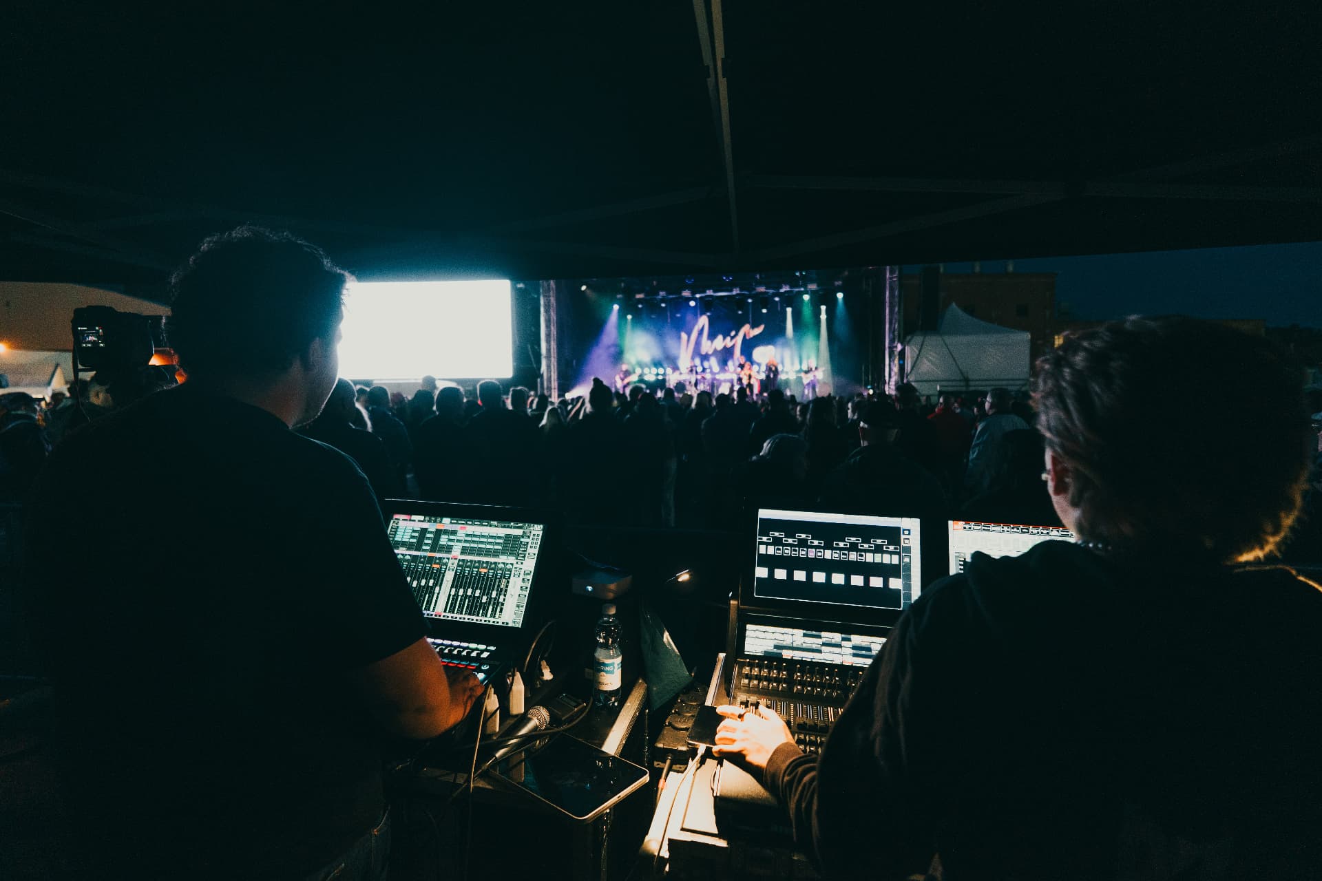 Audio and lighting technicians operating Meiju Suvas's outdoor concert
